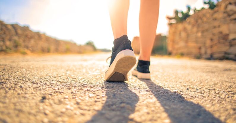 Travel Shoes - Woman Walking on Pathway Under The Sun