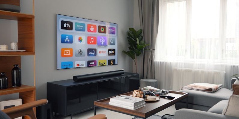 Soundbars - a living room with a large flat screen tv