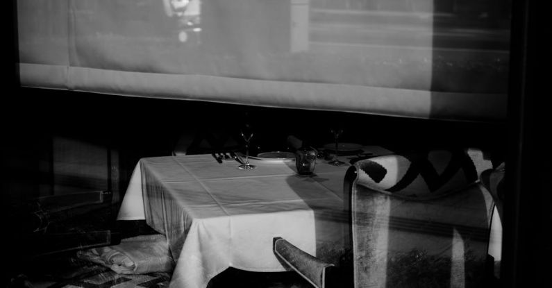 Projectors - Table In Front of a Projection Screen