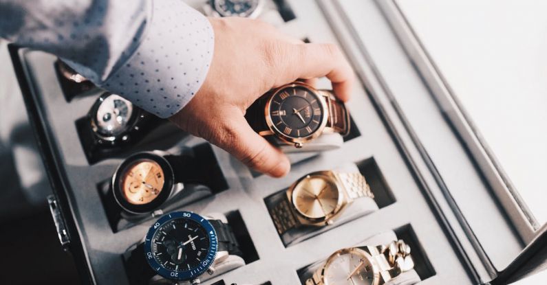 Watches - Person Holding Round Gold-colored Analog Watch With Link Bracelet