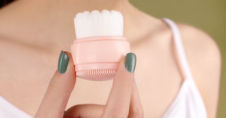 Cleansing Brushes - Woman Holding a Cleansing Brush