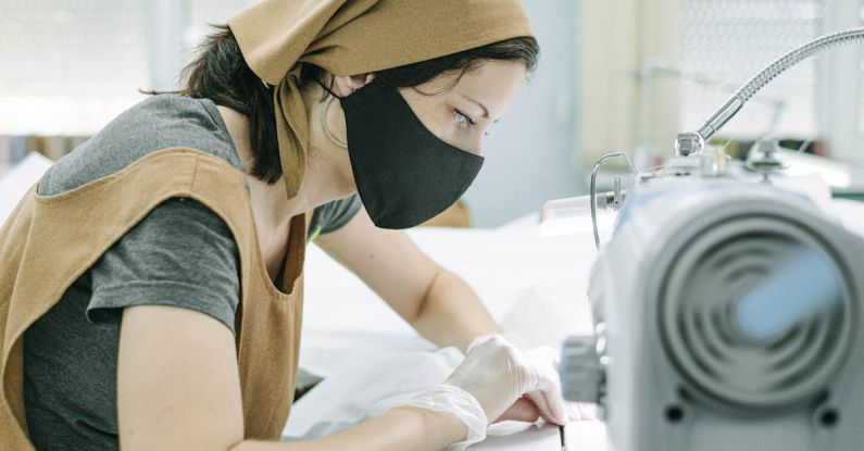 Face Masks - Woman in Bandana and Black Face Mask Working