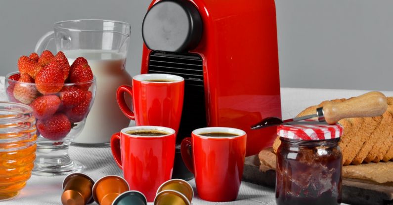 Bread Makers - Red Ceramic Mug Filled With Coffee Near Jam Jar on Table