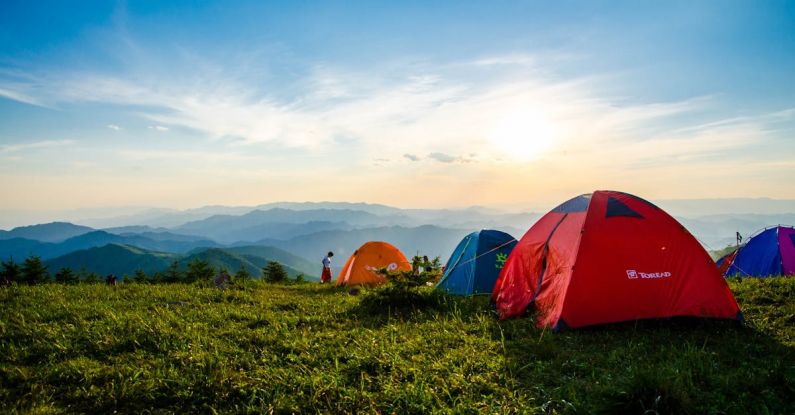 Tents - Photo of Pitched Dome Tents Overlooking Mountain Ranges