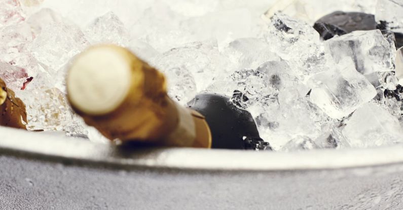 Coolers - Wine Bottles in Stainless Steel Tray Filled With Ice